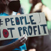 people-not-profit-protest-sign-colin-austin-gbiota