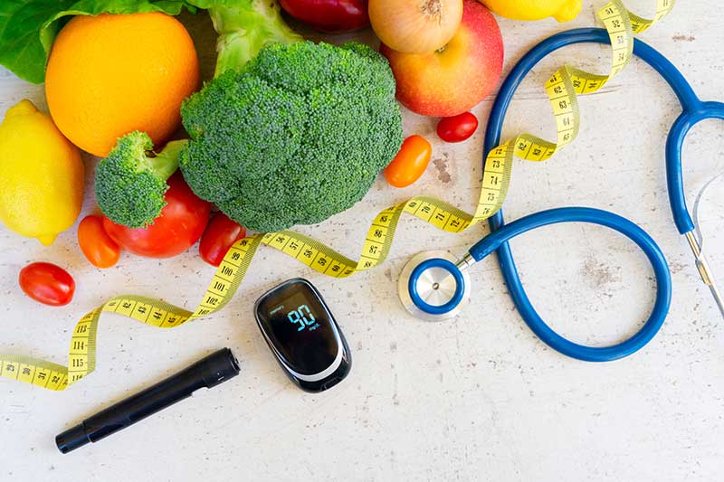 vegetables-and-blood-glucose-meter-lancet-and-stethoscope-diabetes-colin-austin-gbiota