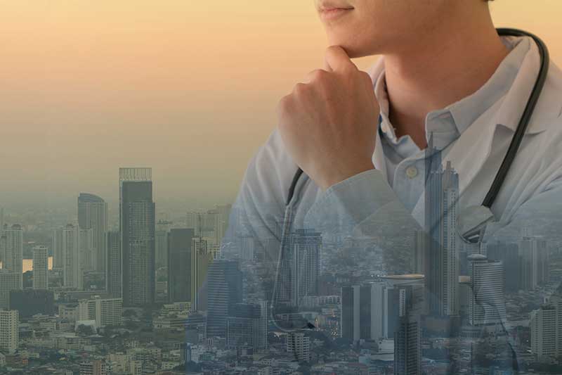 doctor-thinking-city-background-colin-austin-gbiota