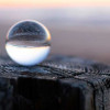 glass-ball-on-stump-sunset-colin-austin-gbiota
