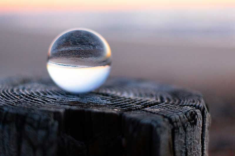 glass-ball-on-stump-sunset-colin-austin-gbiota