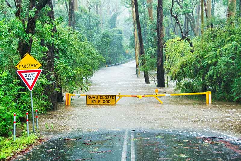 water-closed-by-flood-sign-on-road-colin-austin-gbiota